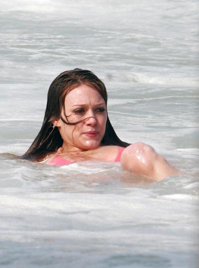 24P Hilary Duff at the Beach playing around in a wet shirt