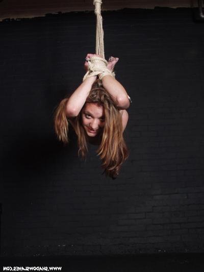 15P Cute brunette slave girl in tight rope suspension bondage