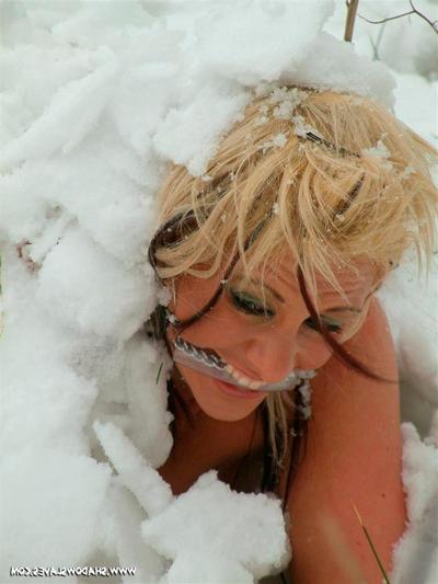 15P Blonde slave girl is gagged and buried naked in the cold snow