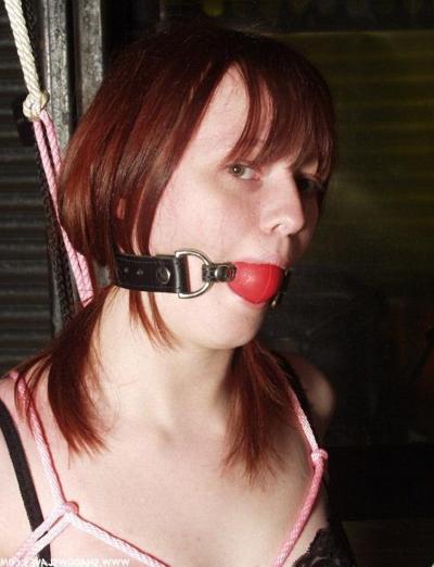 15P Cute redhead bound in pink rope