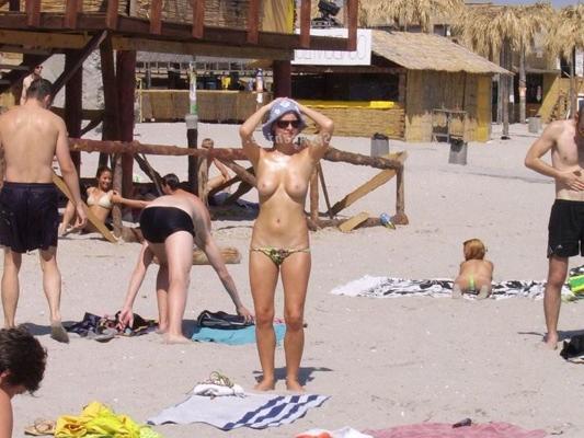 15P Naked girls on a beach