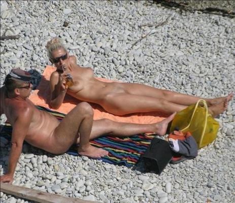 15P Nude teen friends play around at a public beach