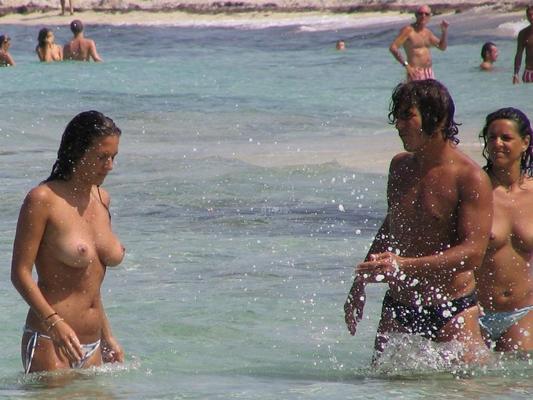15P Bouncy breasted nudist babe strips and bares all