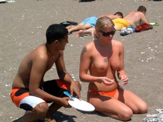15P All eyes are on this sexy nudist as she sunbathes
