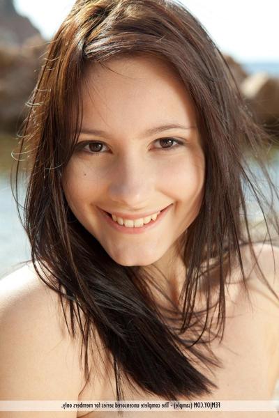 16P Happy erotic teen poser Rosalin on the beach