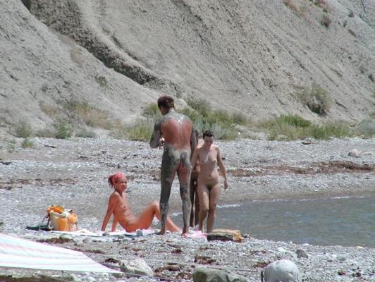 15P Wild redhead teen dances nude at a public beach