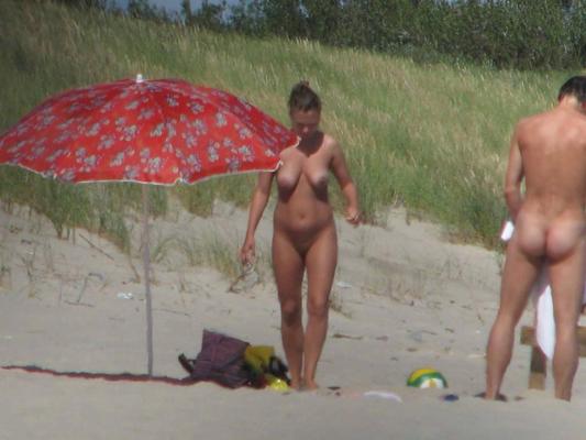 15P Hot Russian nudist strips her bikini off here