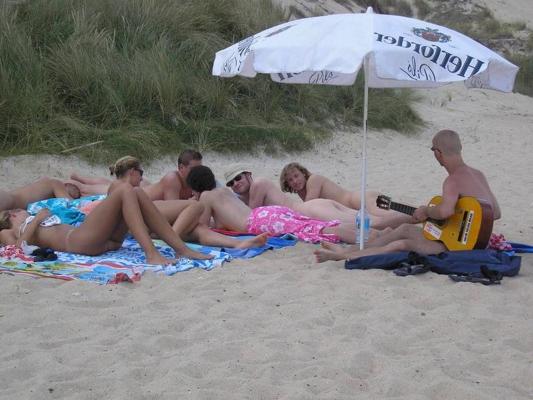 15P Nudist teen not shy about posing nude at the beach