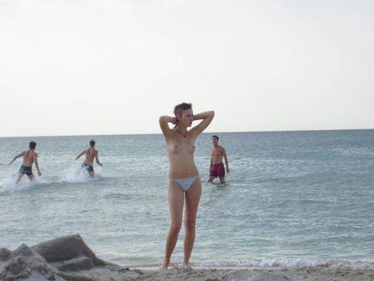 15P A public beach heats up with two hot teen nudists