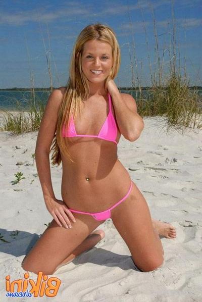 15P Blonde babe at the beach in a bikini