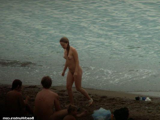 15P Nudist babes on a public beach