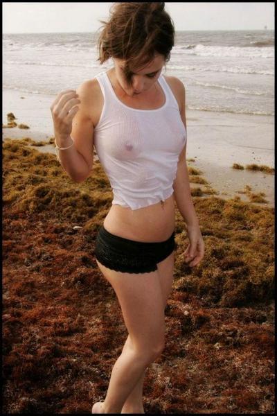 15P Sexy petite Nicole Sparks posing at the beach all wet