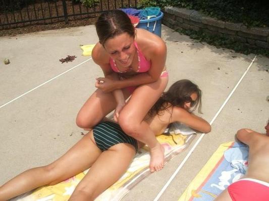 20P College teenies tanning in bikinis