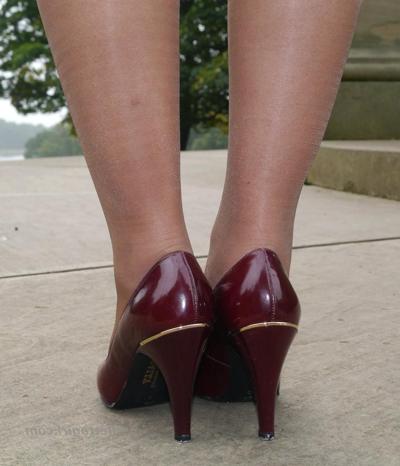 16P Stunning fetish babe shows off her amazing legs wearing a short skirt nylons and