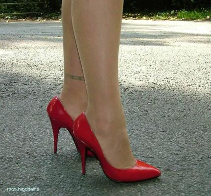 15P Stiletto girl in stockings and red high heels
