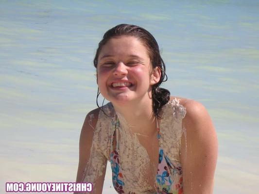 15P Teen cutie Christine Young posing outdoors in the tropics