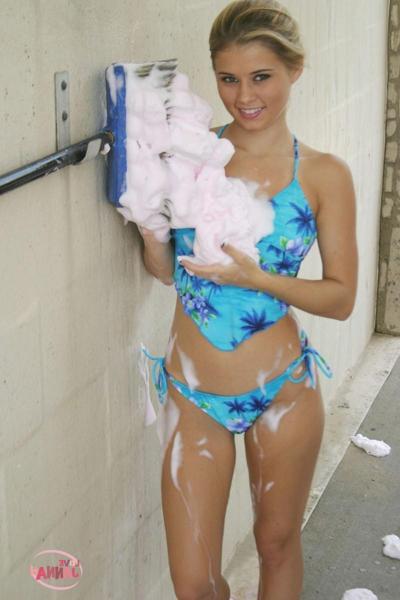 16P Cute blonde teen washing car