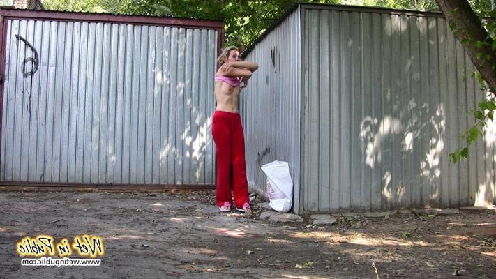 10P Amateur chick wetting her red pants and pink panties on the street