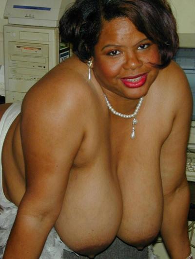 15P Monster tits ebony fattie in office