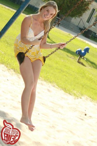 16P Blonde teen with small tits plays on the swings without panties