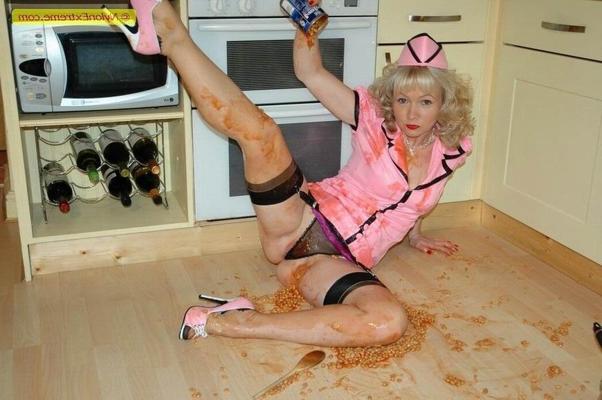 12P Kiny housewife Sue as nurse in her kitchen