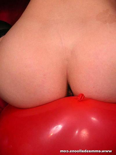 16P busty blonde girl playing with a pink balloon