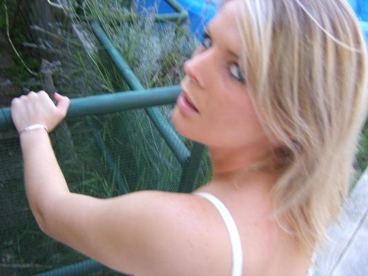 15P Blonde sucking a guy's cock in her garden