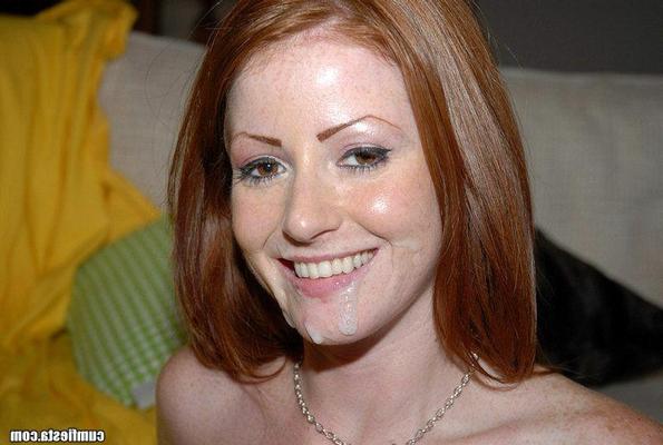 15P Sexy red headed babe catches a nice facial here in these pics