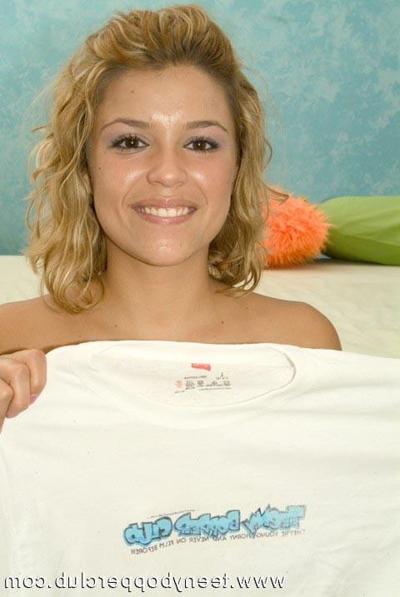 17P Smiling blonde teen cutie shows off smooth shaved beaver