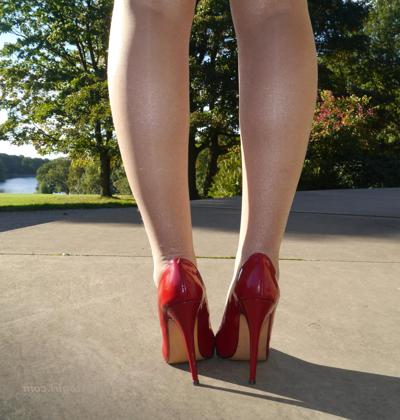 12P Sexy babe with shoe fetish takes a stroll outdoors wearing a tight red dress wit