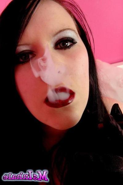 16P goth teen smoking a cigarette