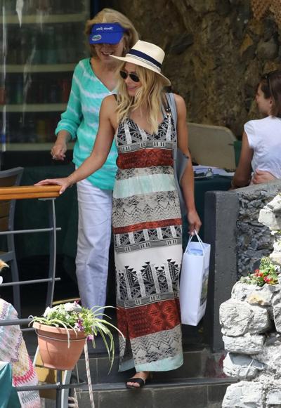 16P Brittany Daniel hot nipple slip in a tiny blue bikini