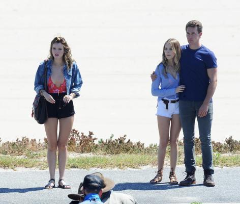 16P Bella Thorne busty in red low cut swimsuit and shorts