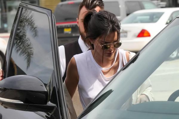 16P Kendall Jenner showing pokies and nipple piercing