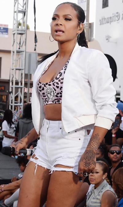 16P Christina Milian busty in sports bra and cutoffs on the stage