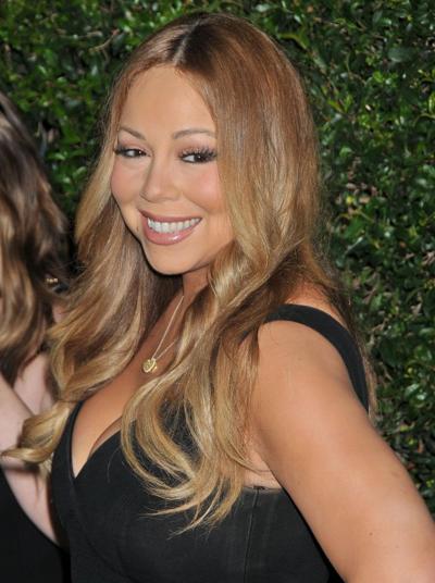 16P Mariah Carey showing huge cleavage at the Hallmark event