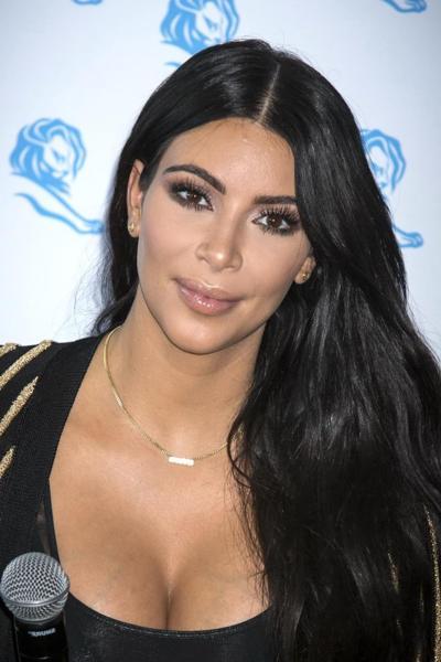 16P Kim Kardashian showing huge cleavage at the Cannes Lions event