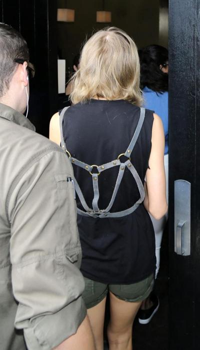 16P Taylor Swift shows off her legs and ass wearing tiny shorts out 