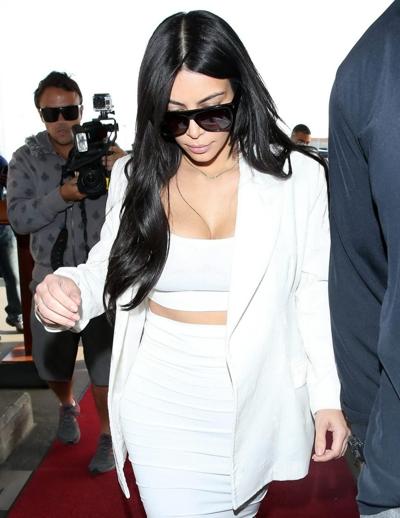 16P Kim Kardashian busty wearing a white crop top at LAX