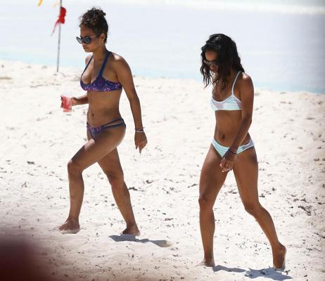 16P Christina Milian and Karrueche Tran flaunts their taut bikini bodies at the beac