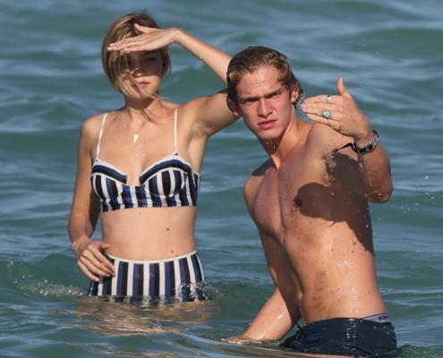 16P Gigi Hadid showing off her hot body in a striped retro bikini at Miami Beach