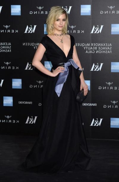 16P Dianna Agron nipple slip in a low cut black dress while arriving at Alexander Mc