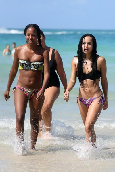 16P Zoe Kravitz showing her juicy ass in tiny tube bikini at a beach in Miami