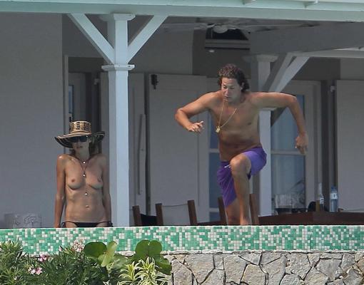 16P Heidi Klum tanning topless poolside in St Barts