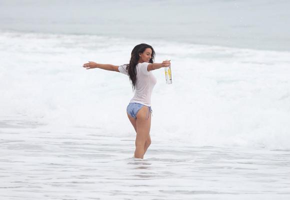 16P Kayla Swift showing off her huge boobs in wet top and bikini bottom at the beach