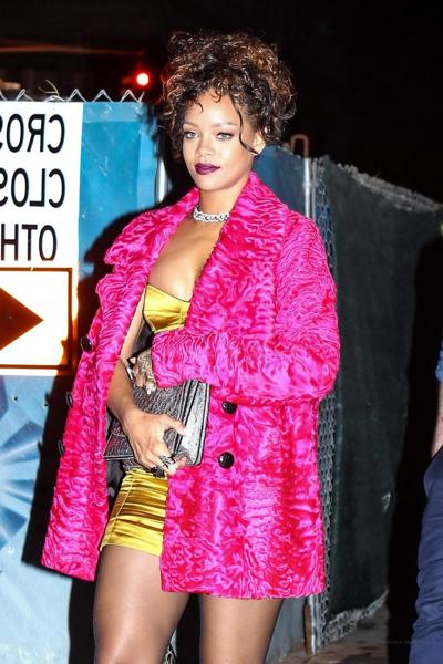 16P Rihanna shows cleavage and legs wearing a little yellow dress outside Nobu resta