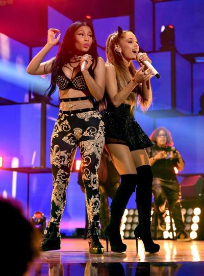 16P Ariana Grande showing off her ass  legs on stage at the iHeart Radio Music Festi