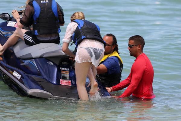 16P Chloe Moretz shows off her juicy ass in a skimpy black bikini at the beach in Mi
