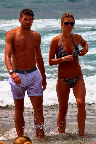 16P Busty Alex Gerrard wearing a bikini on a beach in Ibiza