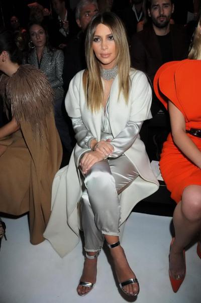 16P Kim Kardashian cleavy wearing low cut white satin gown at Stephane Rolland's fas